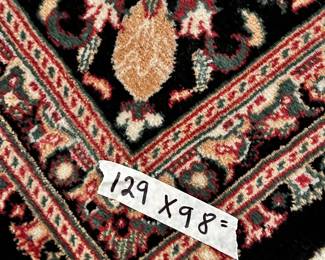 #5	Machine made rug. 129x98" Black w red and green pattern	 $120.00 