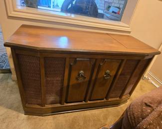 vintage stereo cabinet with turntable