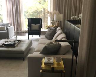 Leather Ottoman and Custom Fabric Sofa Styled