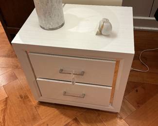 White night stand cabinet with silver accent