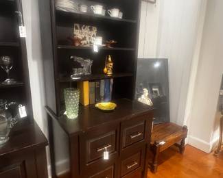 Four drawer, dark wood media console cabinet