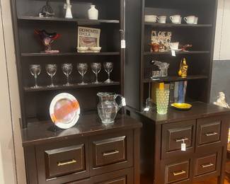 Four drawer, dark wood media console cabinet