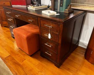 Executive pedestal desk with black leather top