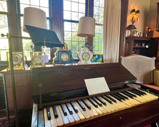 ANTIQUE SPINET PIANO, ANTIQUE CAST IRON MUSIC STAND, CHINA CASED CLOCK AND ATMOS CLOCKS