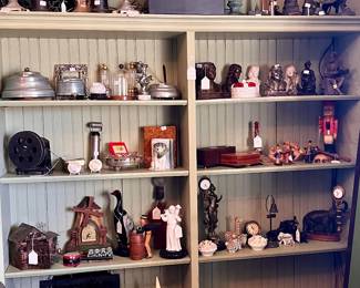 SHELVES FILLED WITH COLLECTIBLES