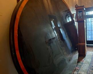 HANDMADE TABLE TOP THAT MIMICS THE OVAL CARTOUCHE CELING DETAIL IN DINING ROOM (WE TOOK IT OFF ITS BASE TO MAKE ROOM)