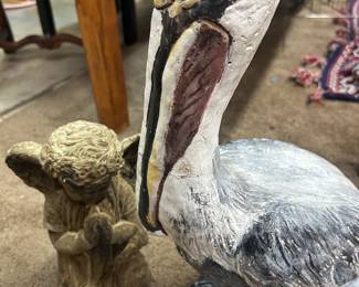 Cement pelican and angel