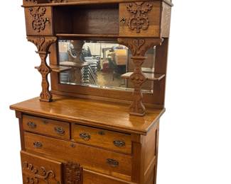 Carved oak sideboard