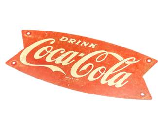Early Coca Cola fish tail metal sign from a cart
