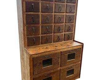 Pine apothecary cabinet w/seed bin drawers.