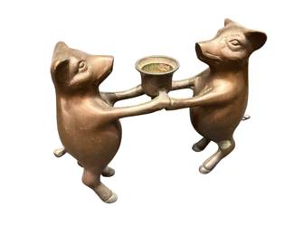 Bronze pigs candle stand