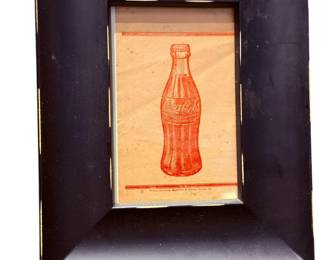 Early coke ad in frame.