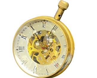 Glass globe mechanical clock