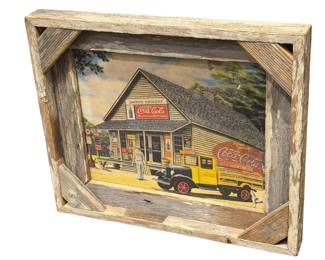 Modern Coke print in barnwood frame.