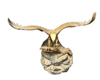 Bronze eagle on rock