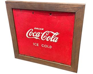 Metal coke sign in wood frame