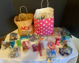 Two Fun Bags Of Packaged Toys