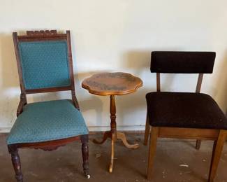 Two Old Chairs And An Old Table