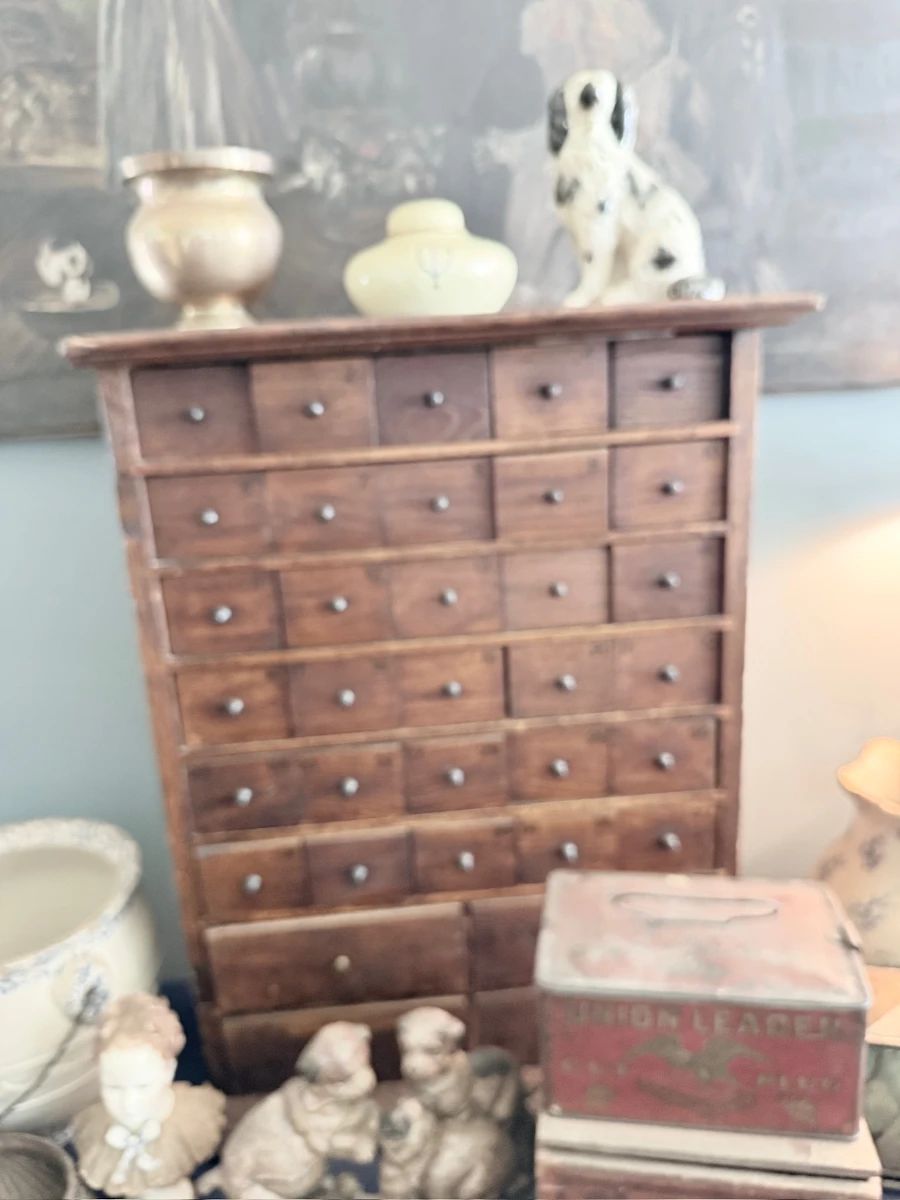 Antique wood apothecary cabinet, 40+ drawers