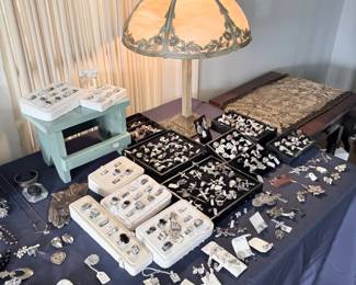 Estate jewelry display with slag glass panel lamp