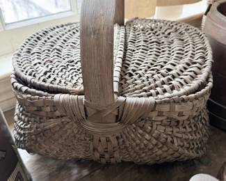 Antique woven splint picnic basket with swing handle