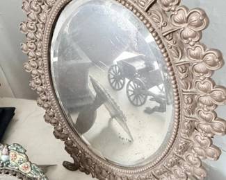 Ornate gilt metal oval vanity table mirror
