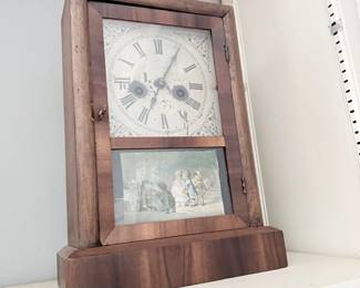 Antique ogee mantel shelf clock with reverse-painted glass
