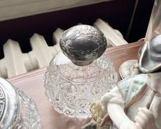 Antique cut glass dresser jars with repousse silver lids