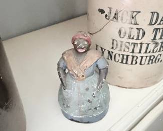 Antique cast iron figural woman still bank