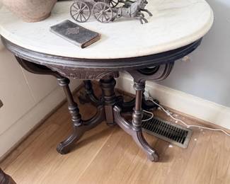 Victorian oval marble-top parlor table with carved base