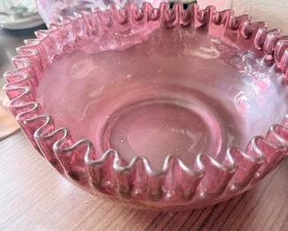 Antique cranberry glass ruffled bowl with crimped rim