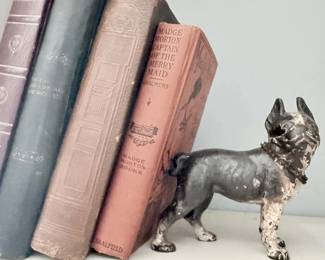 Cast iron Boston terrier dog figurine with antique books