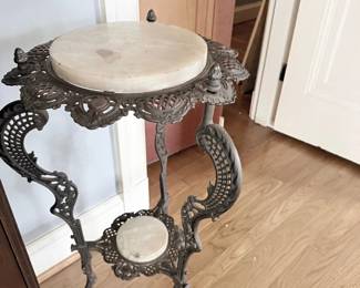 Ornate cast iron marble-top plant stand pedestal table