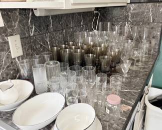 Large lot of glassware, stemware, and serving bowls