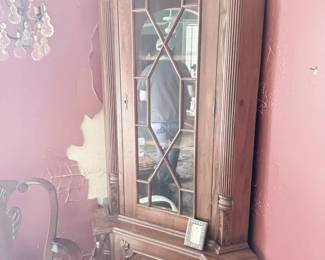 Antique corner china cabinet with mullioned glass door