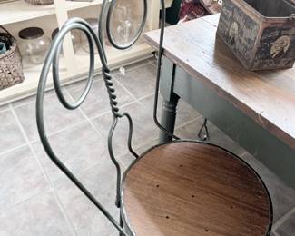 Antique wrought iron ice cream parlor chair with wood seat
