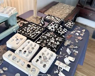 Estate jewelry tables, rings, earrings, and pendants