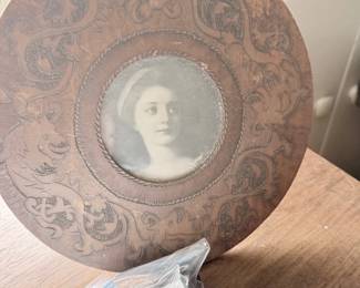 Antique carved round wood frame with Victorian portrait