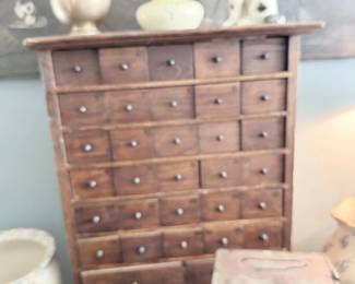 Antique wood apothecary cabinet, 40+ drawers