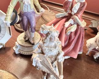 Antique porcelain figurines, colonial couple and lace lady