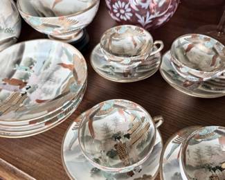 Antique Japanese hand-painted porcelain tea set, cups and saucers
