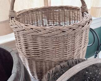 Antique wicker gathering basket with tall handle