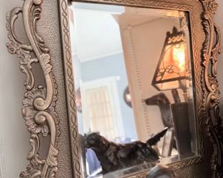 Ornate silver gilt rococo framed wall mirror