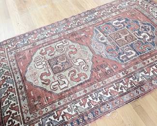 Persian hand-knotted wool area rug, rust and ivory medallion