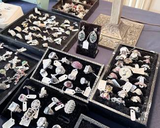 Estate jewelry cases, rings, earrings, and brooches