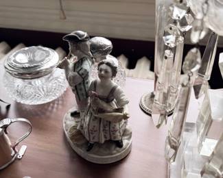 Porcelain figurine, cut crystal jars and glass lustres