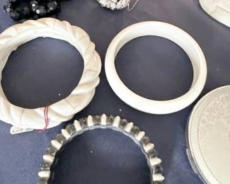Sterling silver compacts, powder jar lids, and beaded jewelry