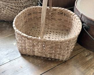 Antique woven splint baskets and wood firkin buckets