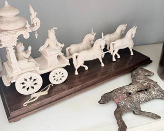 Cast iron horse-drawn circus wagon toy and rocking horse bank