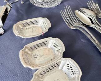 Sterling silver reticulated nut dishes and flatware
